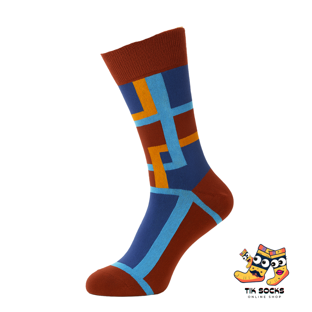 Colorful sock with geometric pattern on a white background, featuring the Tik Socks brand logo.