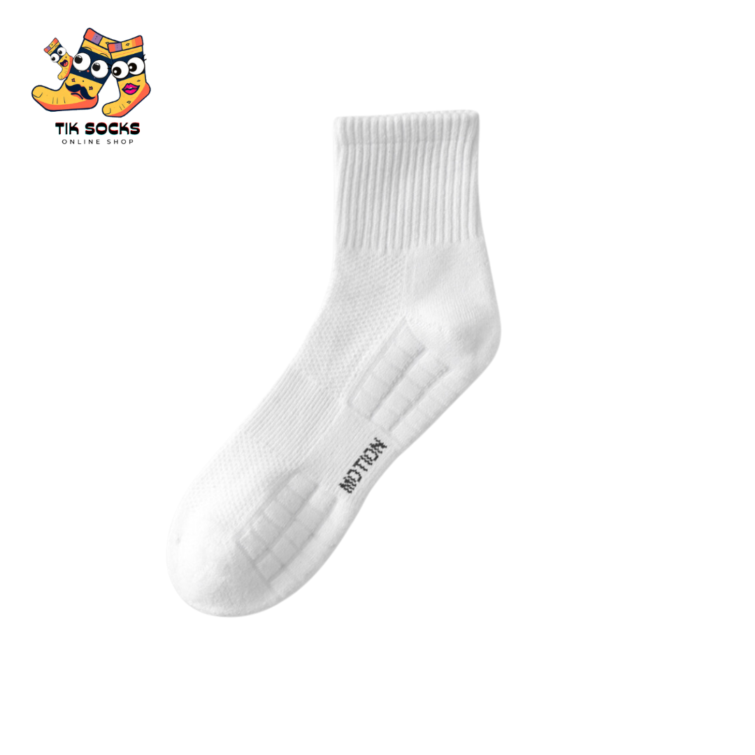 white, and black combed cotton socks displayed side by side, highlighting their superior softness and quality.