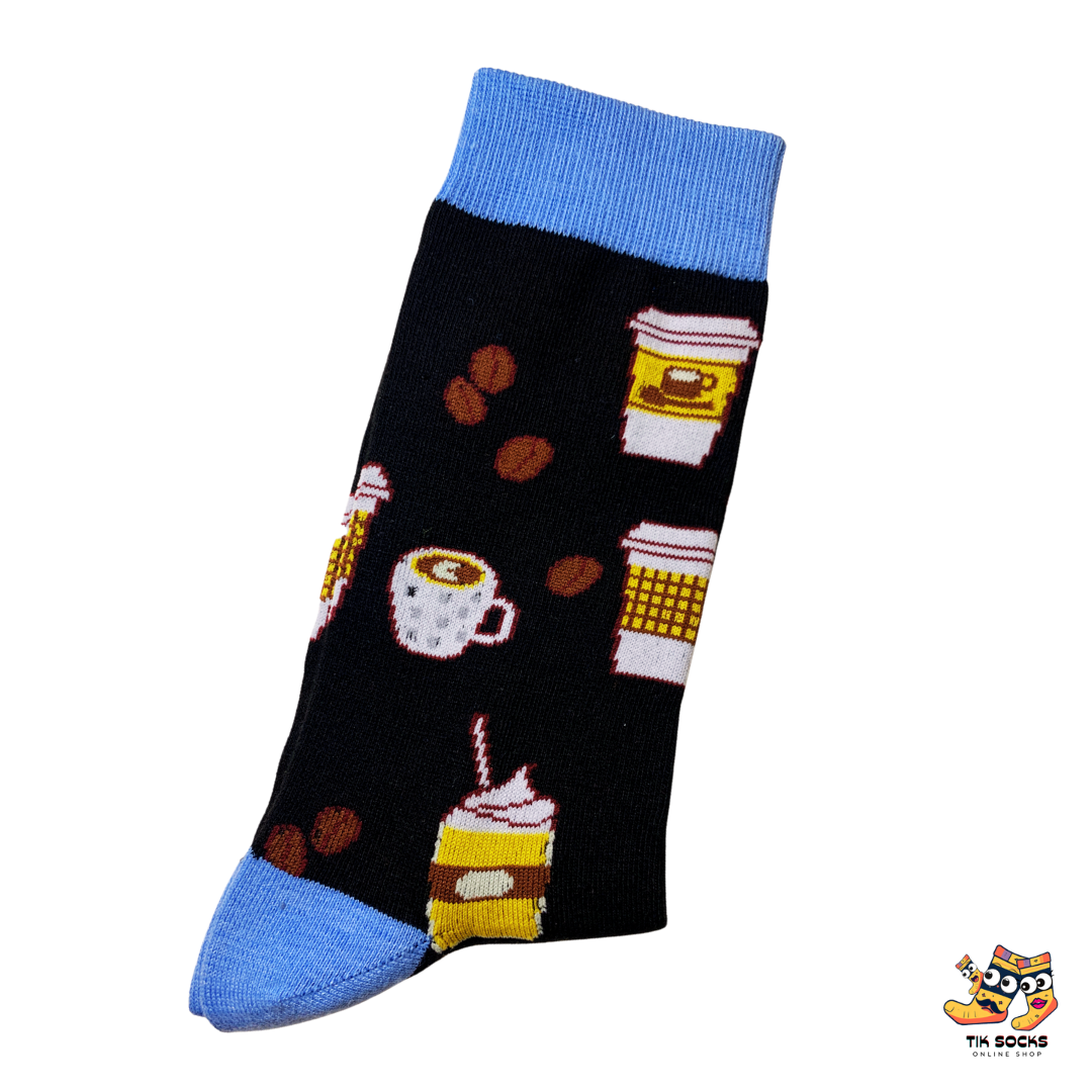 Men's and women's socks featuring a pattern of steaming coffee mugs, coffee beans, and espresso shots on a cozy-colored background