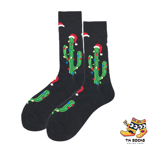 Men's and women's Christmas socks featuring a playful cactus wearing a Christmas hat and adorned with festive decorations, adding a unique holiday twist