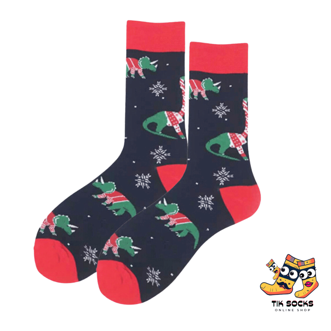 Men's and women's Christmas socks adorned with playful crocodile illustrations, showcasing festive holiday attire and cheerful expressions