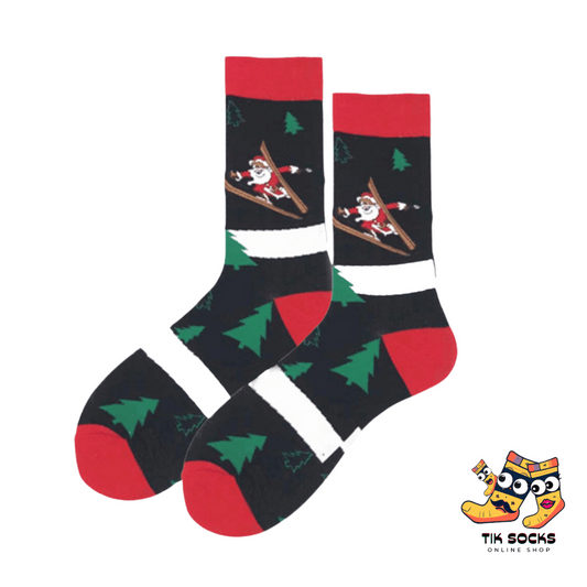 Men's and women's Christmas socks featuring playful Santa Claus skiing illustrations, complete with Santa attire and snowy slopes