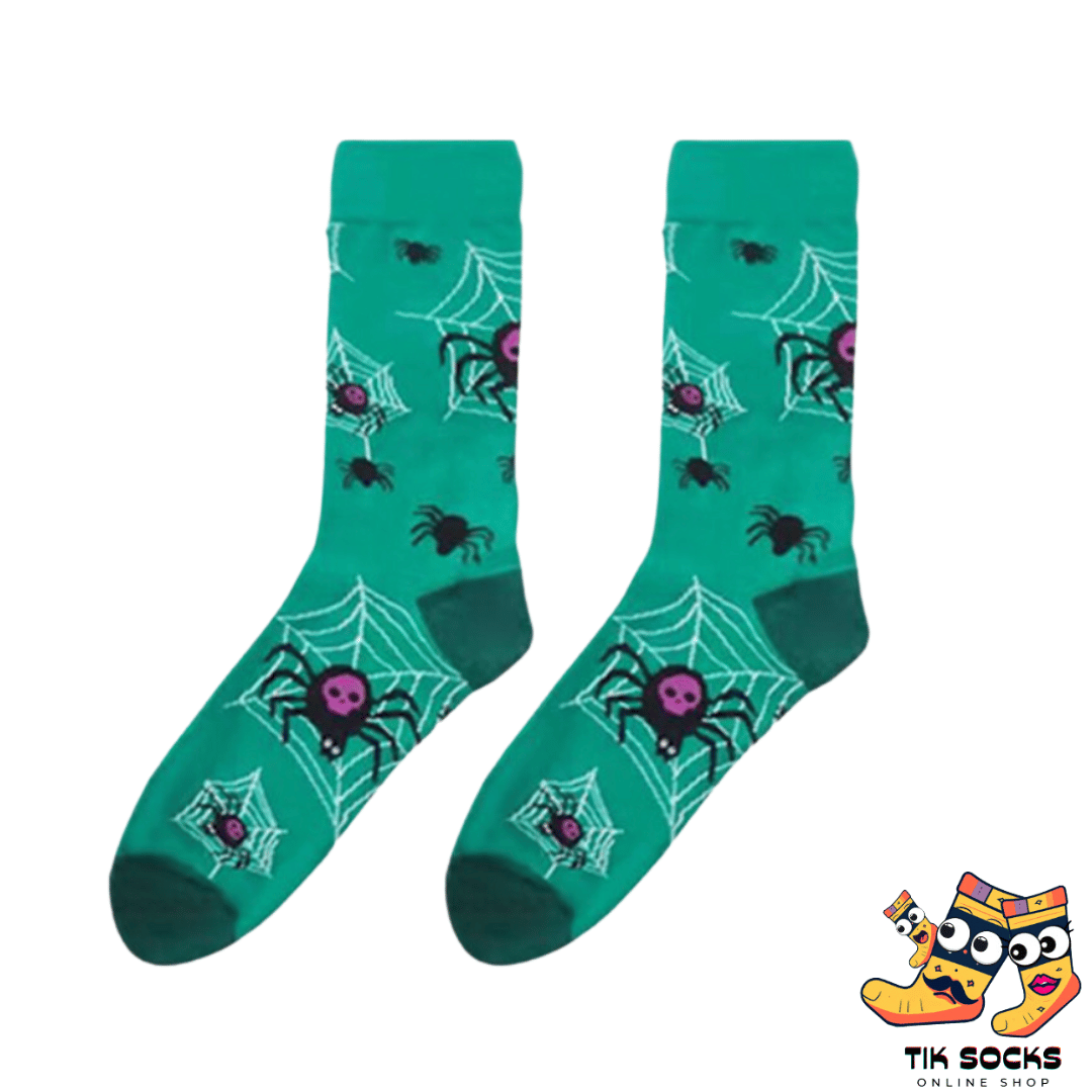 Soft cotton socks adorned with festive pumpkin designs, perfect for Halloween celebrations and gifting. Multiple images showcasing various Halloween-themed patterns for the holiday season