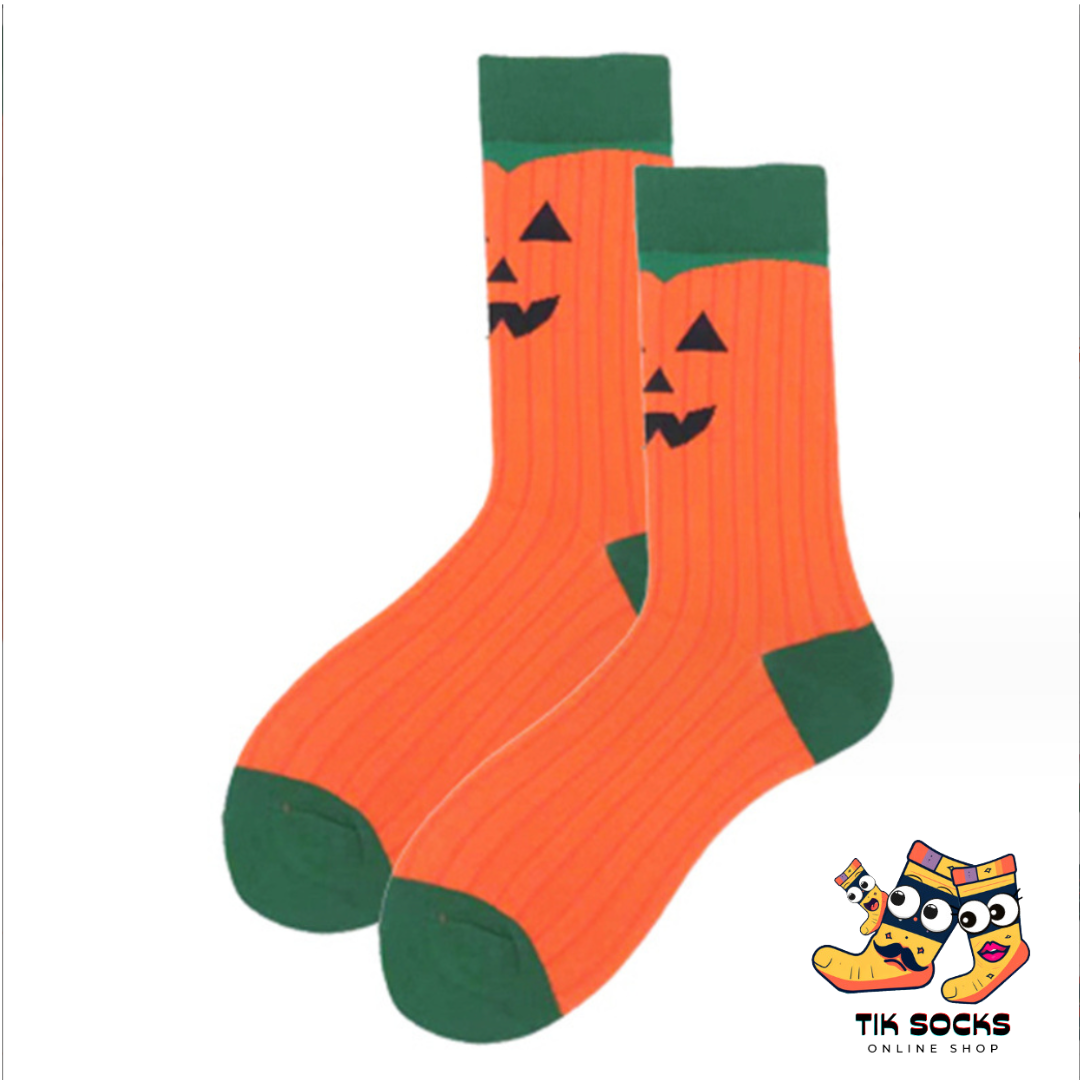 Soft cotton socks adorned with festive pumpkin designs, perfect for Halloween celebrations and gifting. Multiple images showcasing various Halloween-themed patterns for the holiday season