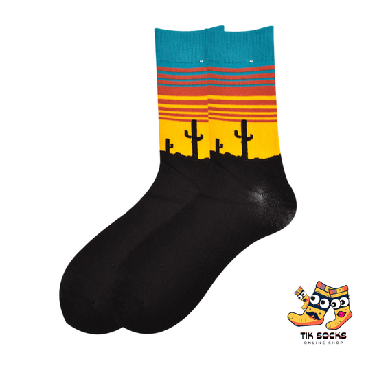 Men's and women's socks showcasing the iconic silhouette of Joshua Trees, set against a desert landscape with a starry or sunset sky