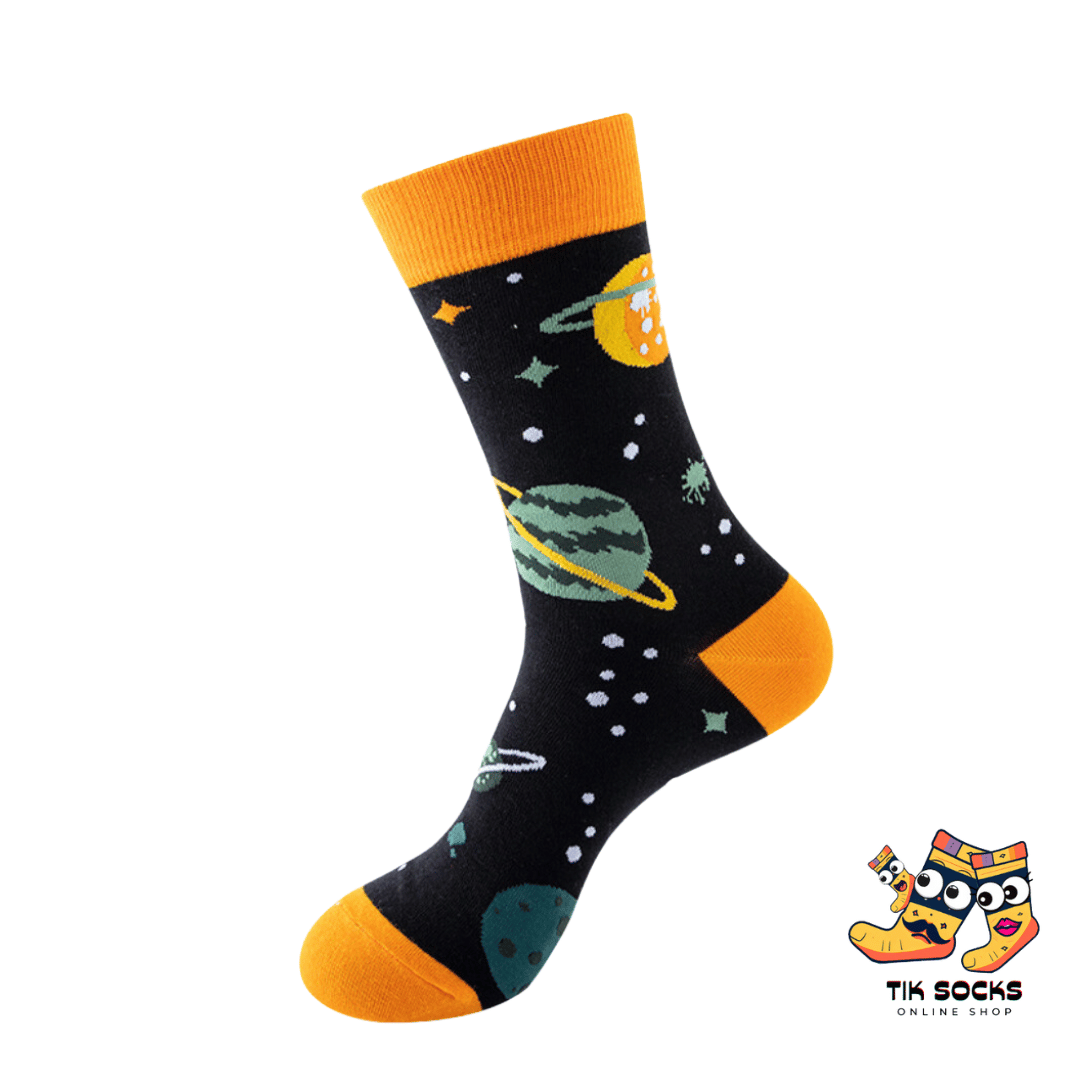 Men's and women's socks adorned with colorful graphics of various planets, stars, and cosmic elements, set against a deep space background