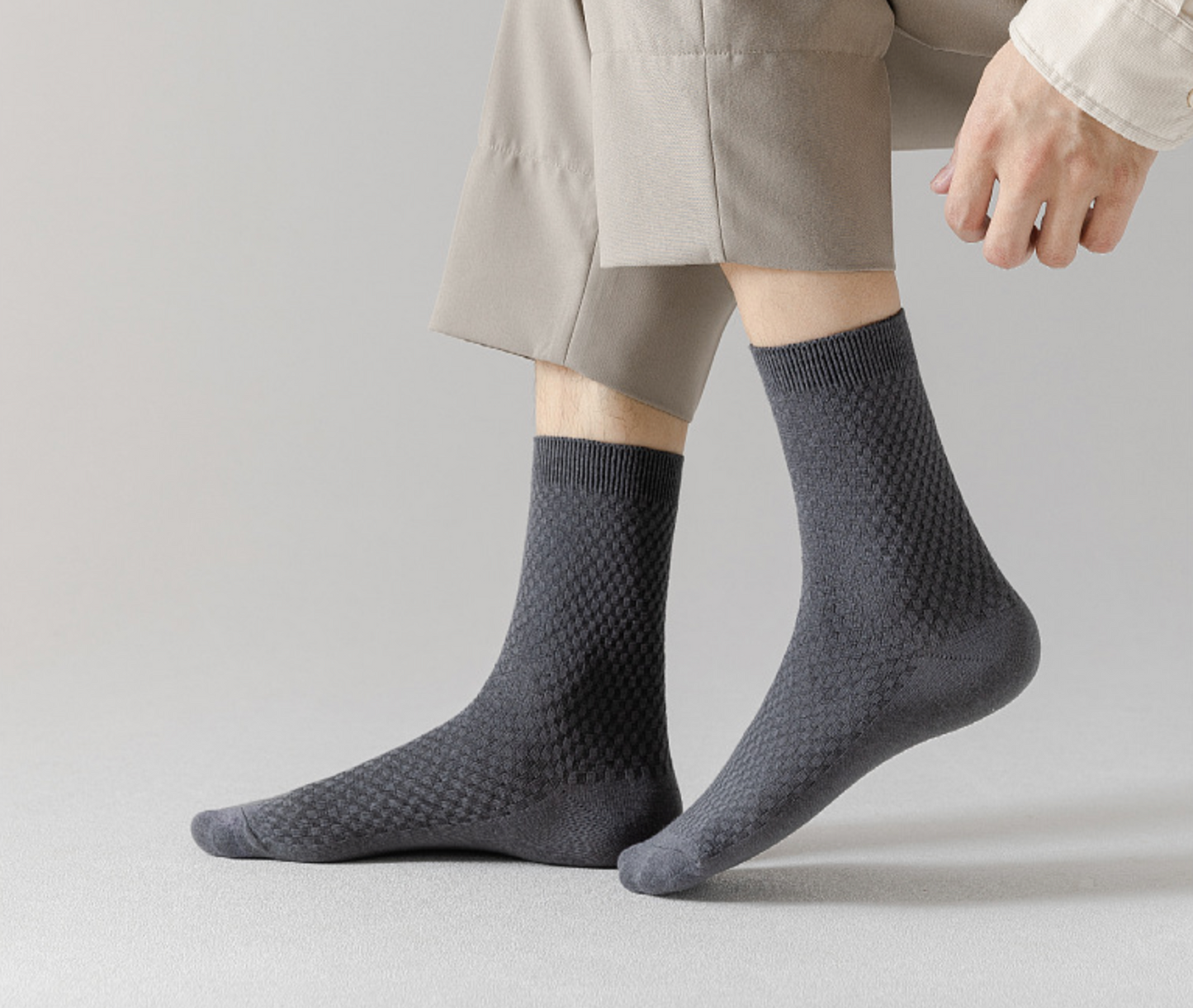 Black, dark grey, and grey bamboo fiber socks, showcasing their eco-friendly and breathable design, suitable for everyday wear and comfort