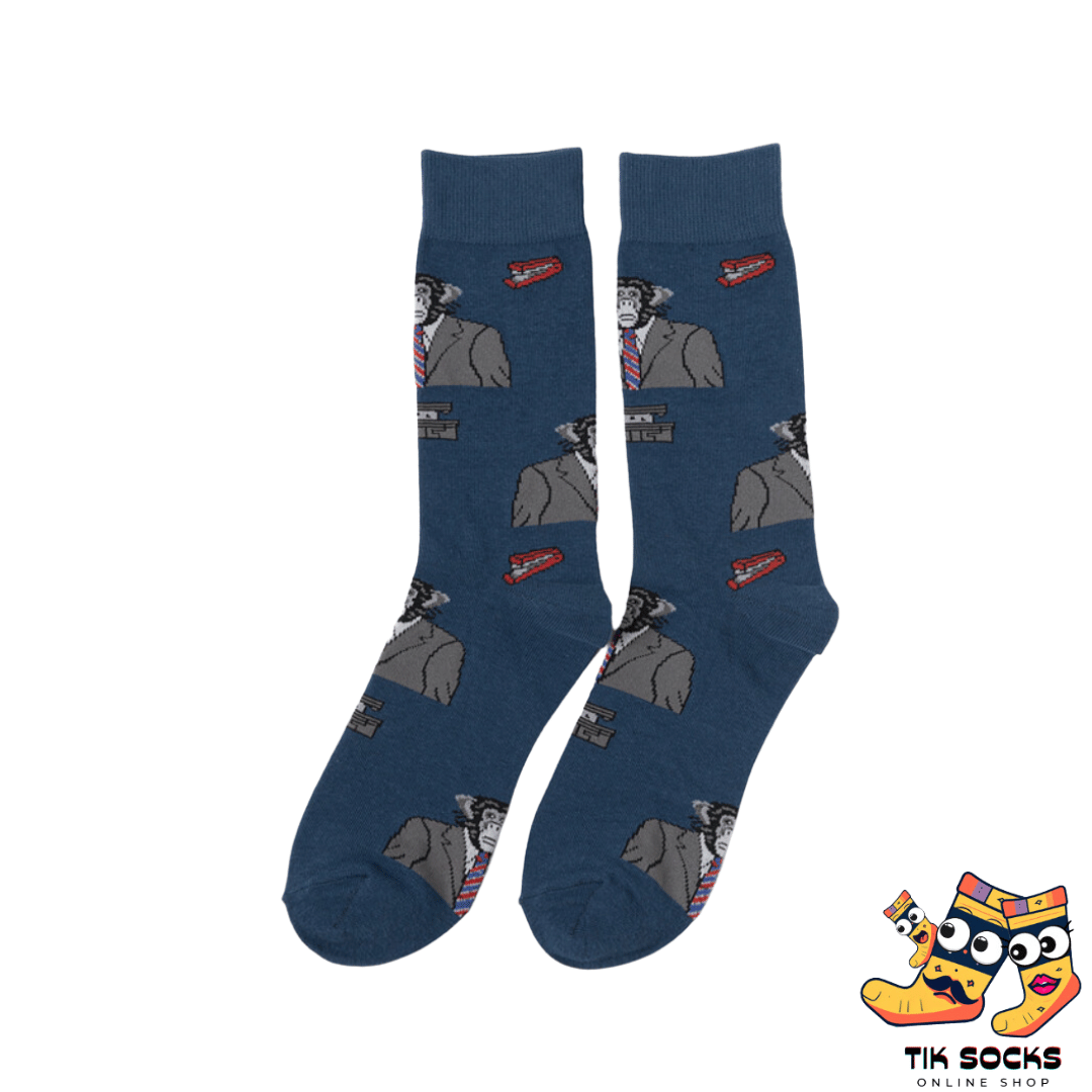Men's and women's socks featuring a graphic of a chimpanzee dressed in a formal suit with a tie