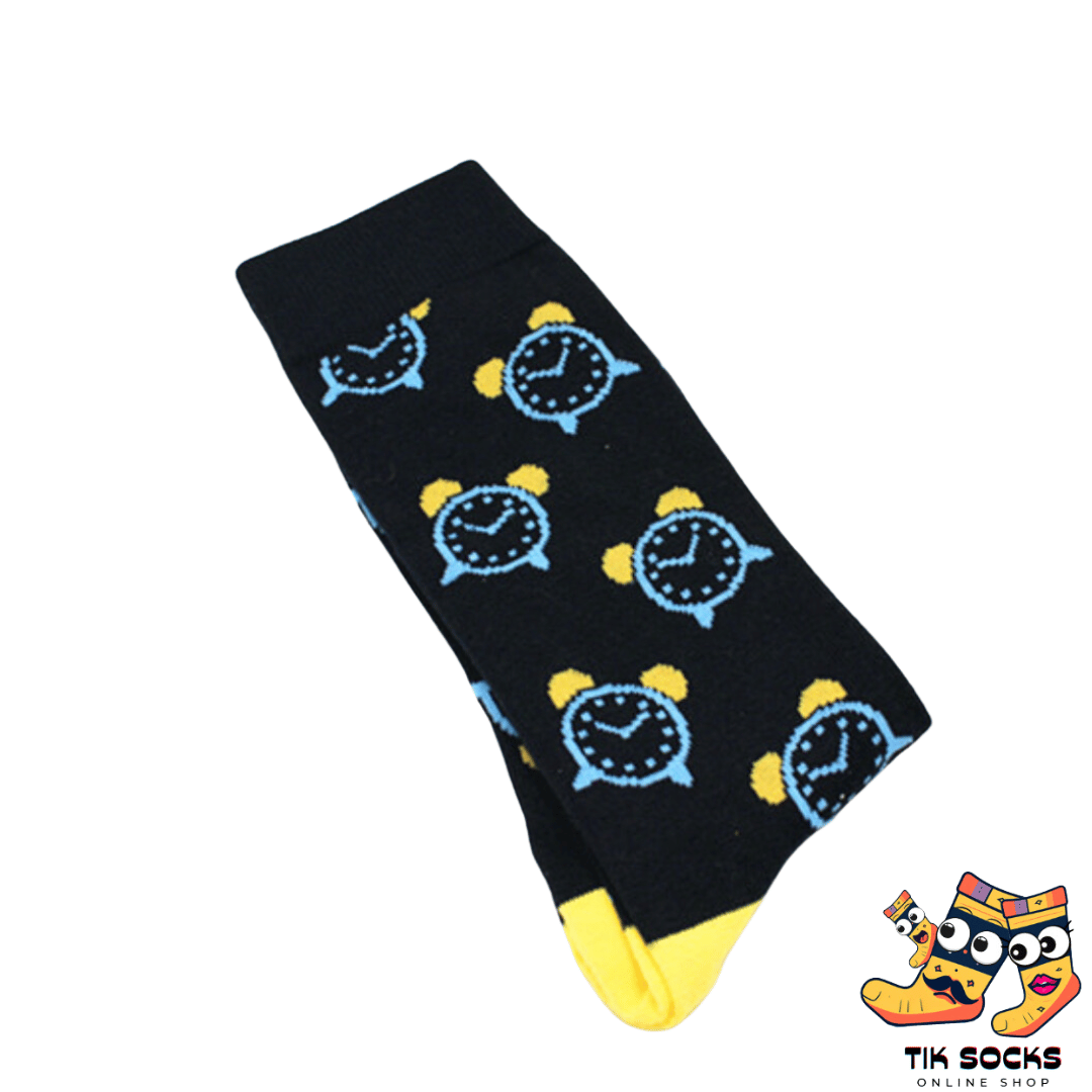 Men's and women's socks adorned with various clock faces showing different times, set against a neutral background