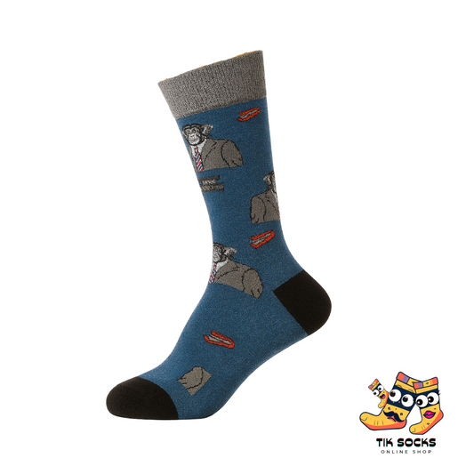 Blue sock with gray dog illustrations on a white background, featuring Tik Socks branding.