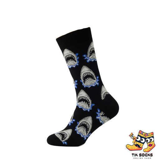 Black sock with shark pattern on a white background, featuring Tik Socks branding.