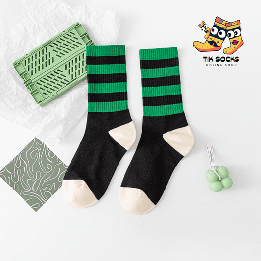 Socks with a black and white chessboard pattern, reflecting the timeless allure of classic board games and the latest fashion trends