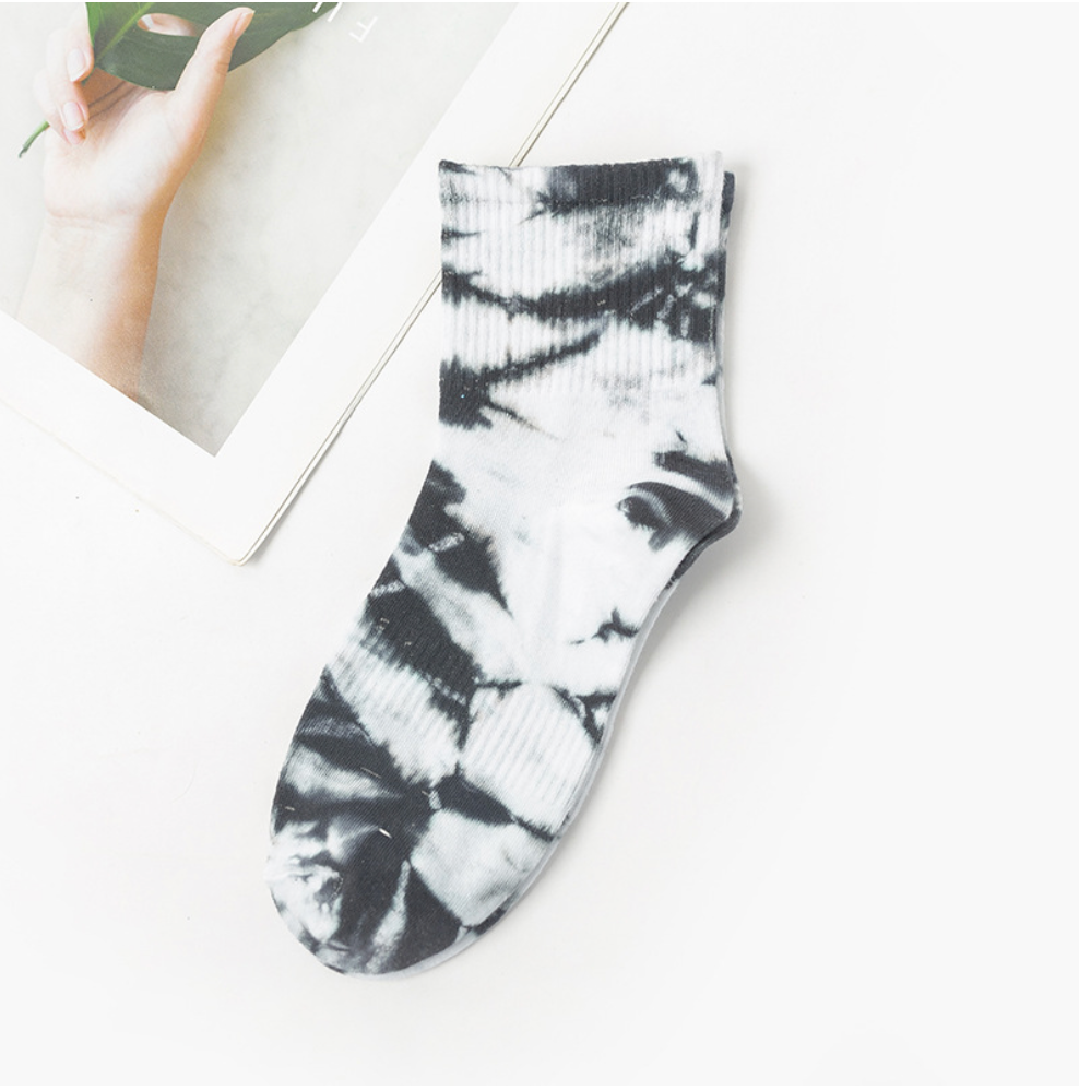 Vibrant tie-dye socks with a unique blend of colors, highlighting premium quality and trendy design suitable for modern fashion enthusiasts.