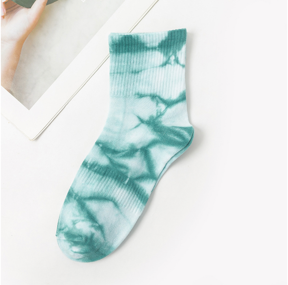 Vibrant tie-dye socks with a unique blend of colors, highlighting premium quality and trendy design suitable for modern fashion enthusiasts.