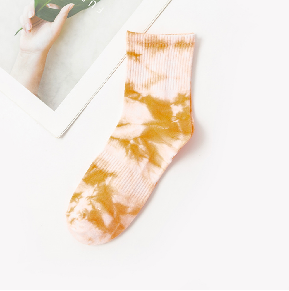 Vibrant tie-dye socks with a unique blend of colors, highlighting premium quality and trendy design suitable for modern fashion enthusiasts.